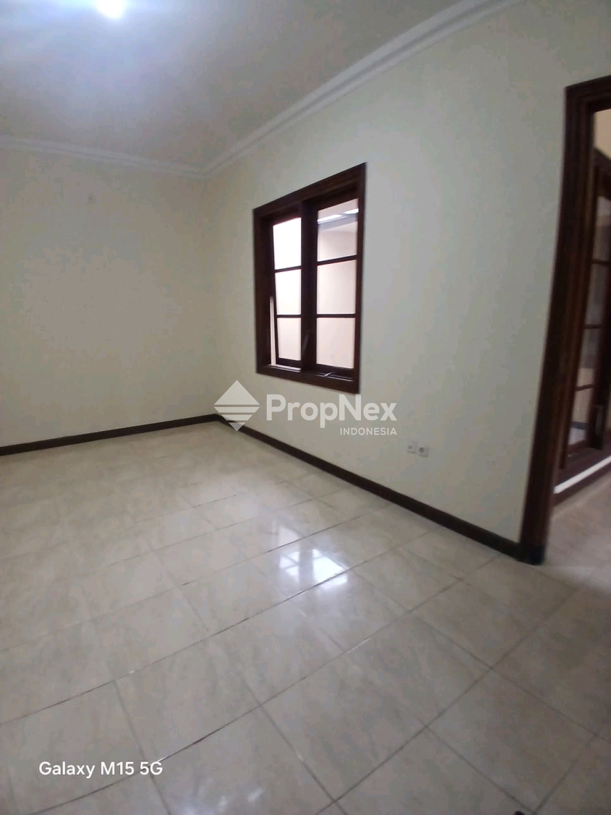 Disewakan Rumah Citraland Utama Cluster Depan Surabaya — foto 2