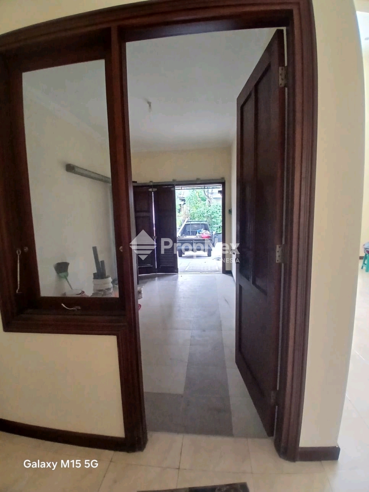 Disewakan Rumah Citraland Utama Cluster Depan Surabaya — foto 5