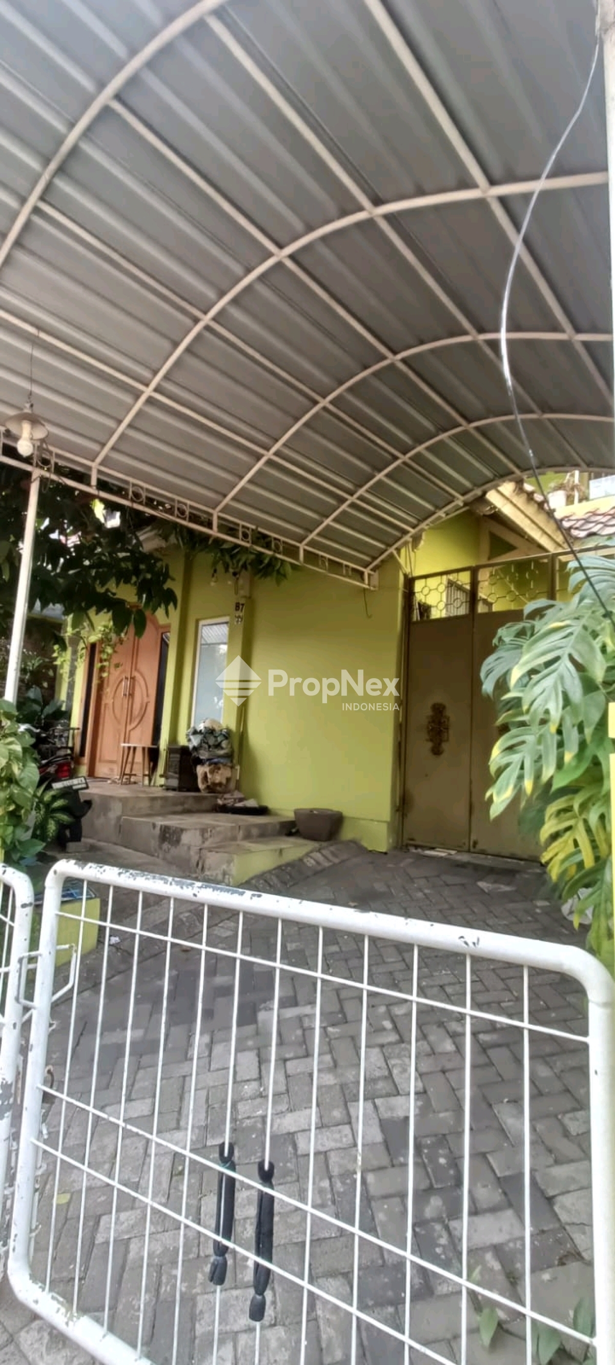 Rumah Terawat Citraland Gwalk International Village — foto 2